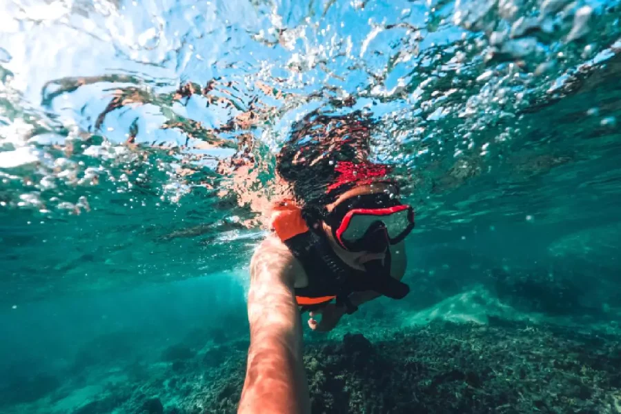 Bioluminescent plankton glow on Plankton Swimming Krabi by Long Tail Boat